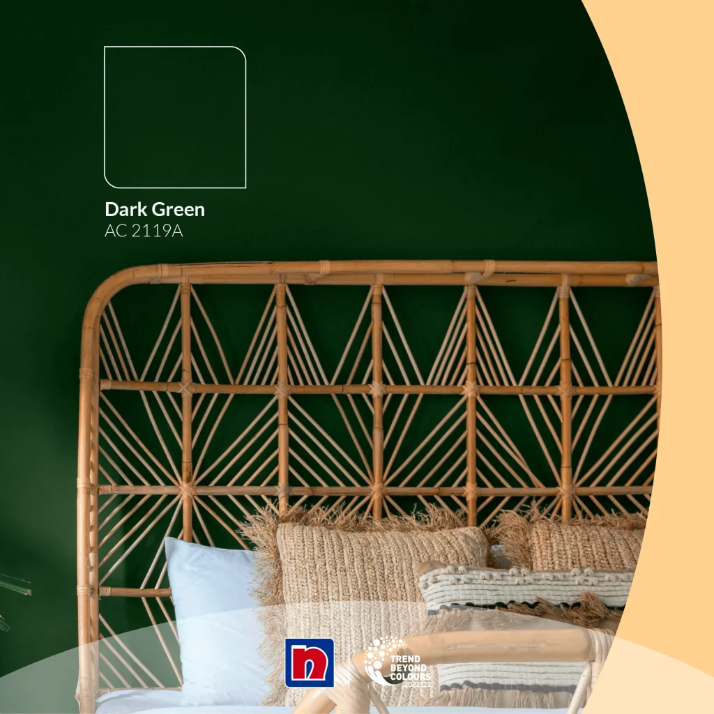 ผนังห้องนอนโทนสีเขียวเข้ม dark green AC2119A กับเตียงไม้หวาย